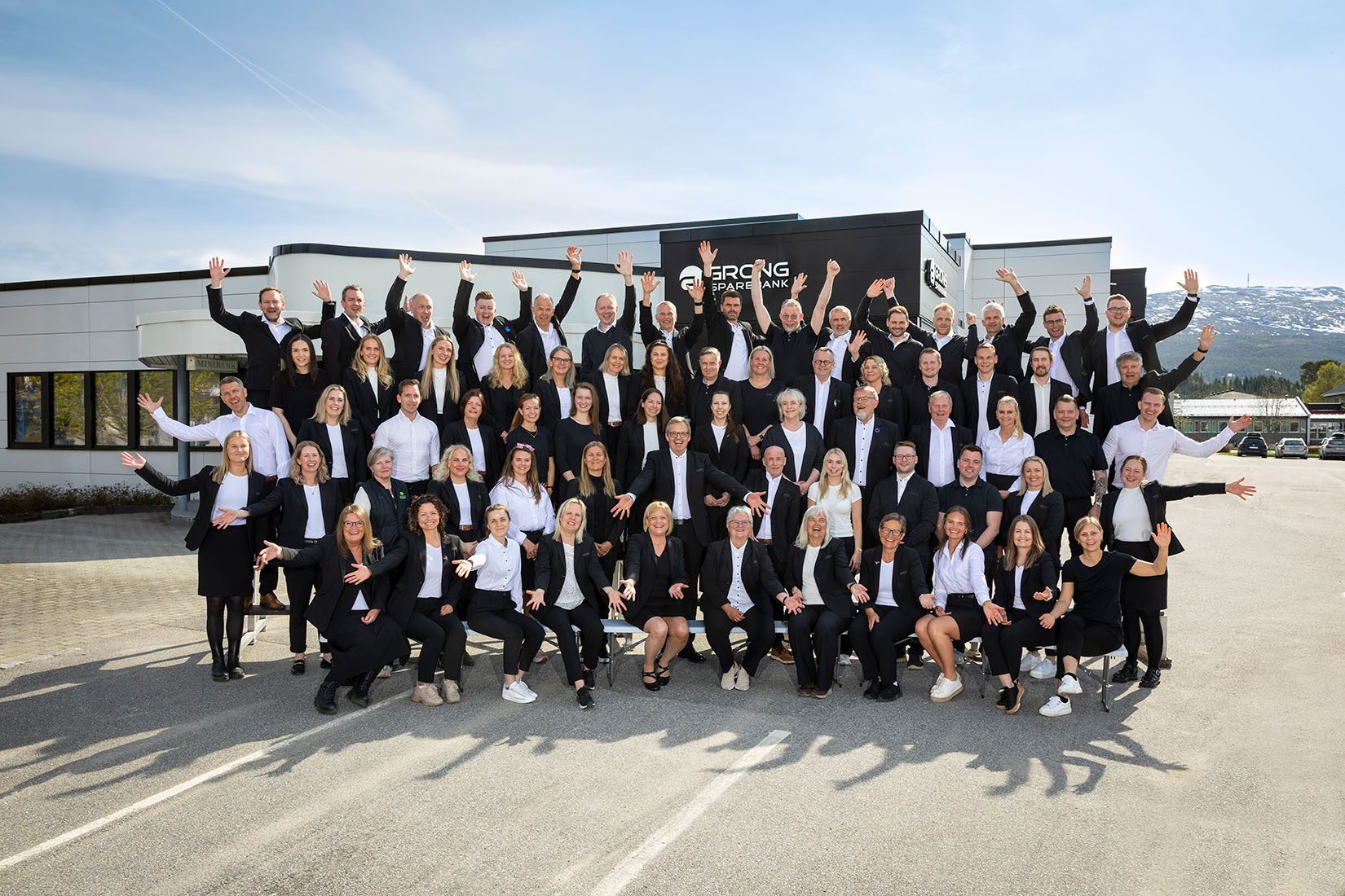 Social group, Formal wear, White-collar worker, Dress shoe, Team, Smile, Uniform, Crew, Suit, Pantsuit