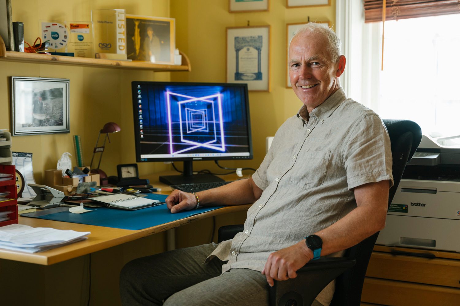 Picture frame, Personal computer, Smile, Furniture, Table, Peripheral, Desk
