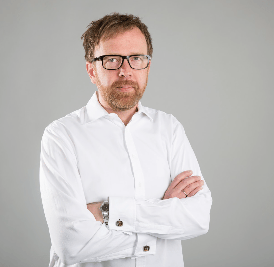 Dress shirt, Vision care, Glasses, Chin, Arm, Eye, Jaw, Sleeve, Gesture, Collar