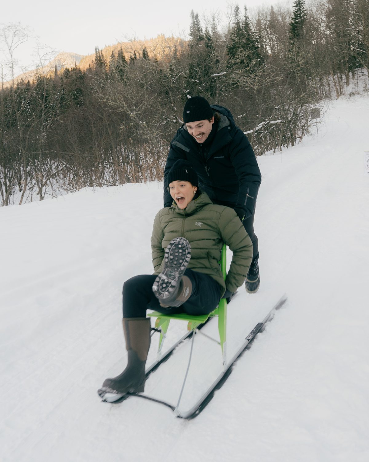 Playing in the snow, Winter sports, Sled, Recreation, Freezing, Sledding, Smile, Sitting