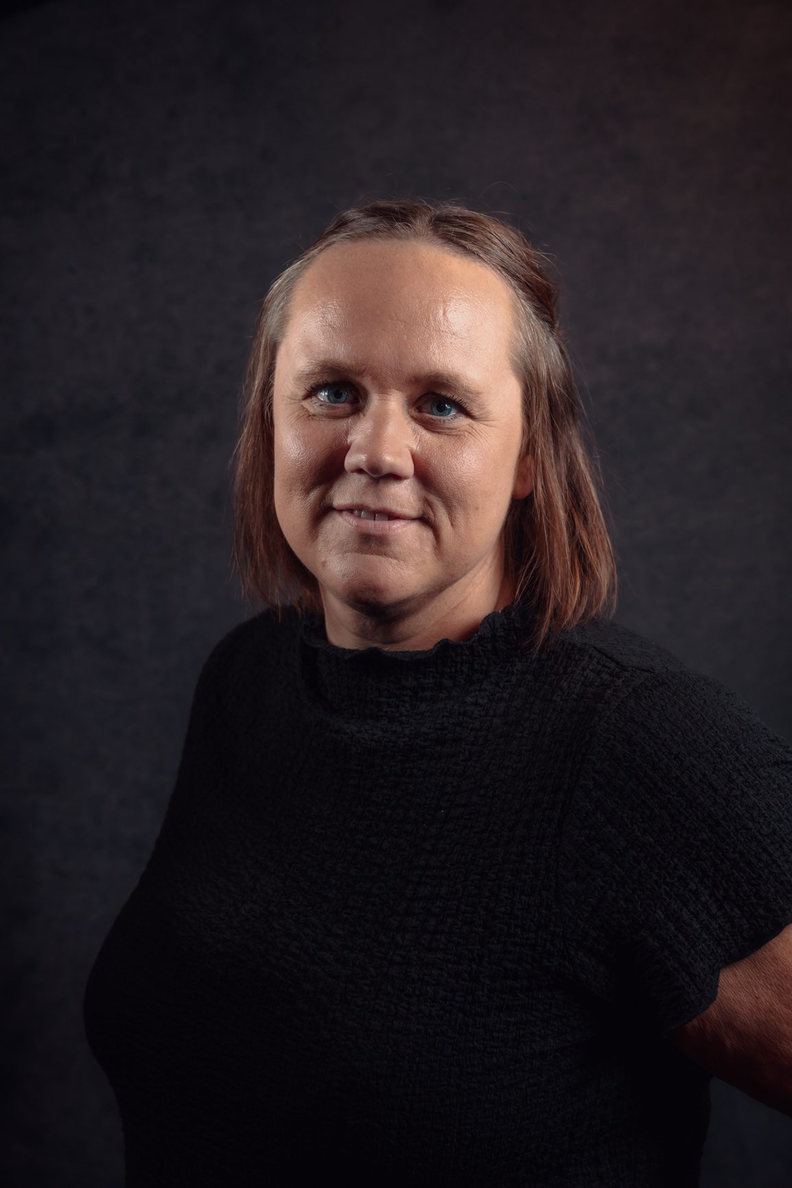 Grethe Lykke, portrettbilde av kvinnelig ansatt i TA Kreativ - et mediebyrå i Trøndelag og en del av Trønder-Avisa