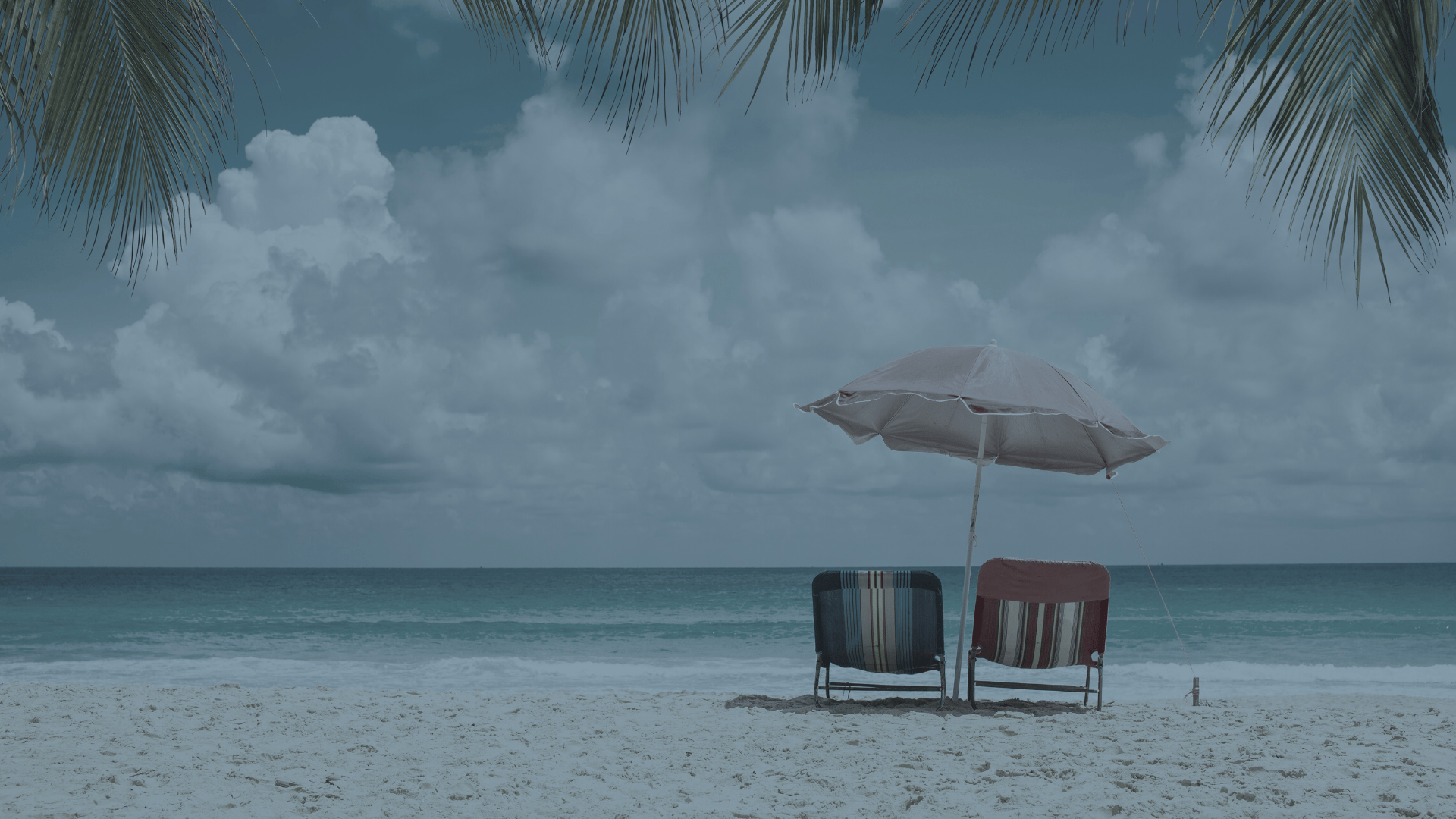 Coastal and oceanic landforms, Outdoor furniture, Beach, Umbrella, Sea, Cloud, Coast, Shore, Sand, Ocean