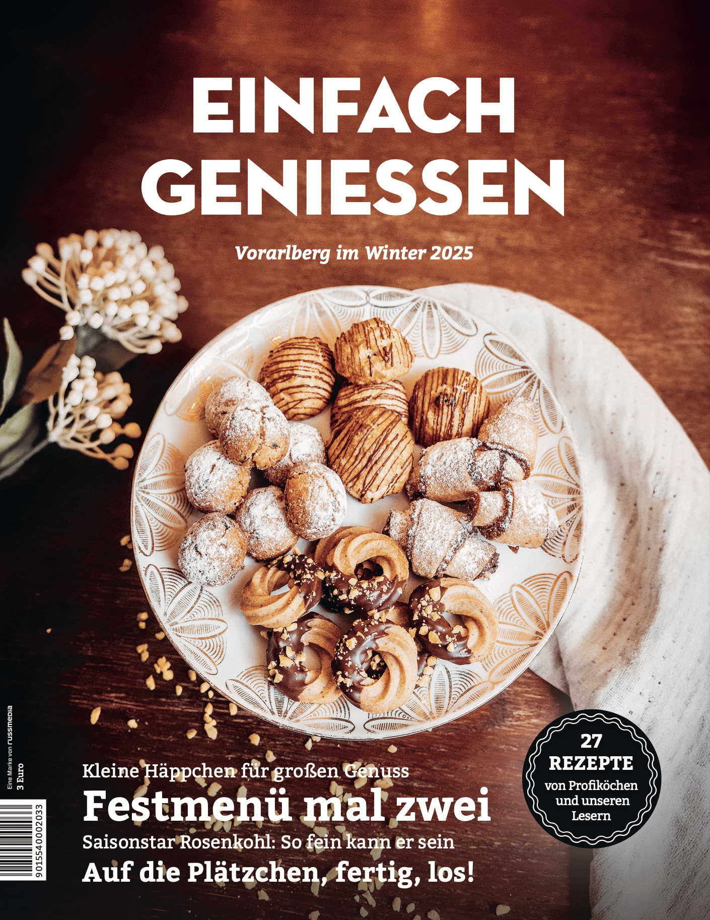 Magazine cover for "EINFACH GENIESSEN" featuring a plate of assorted festive cookies.