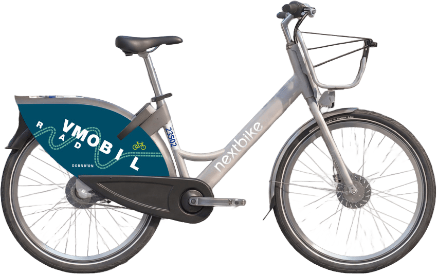 A light gray nextbike with Vmobil branding and a front basket.