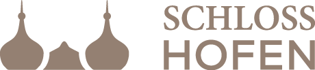 Logo for "SCHLOSS HOFEN" with abstract castle domes on a green background.