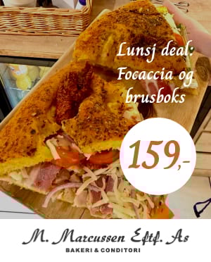 Large focaccia sandwich advertised as a lunch deal with soda for 159 kr.