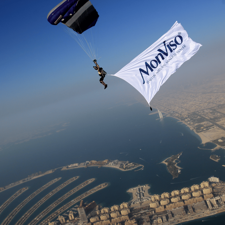 Air travel, Water, Sky, Daytime, Parachute, Paragliding