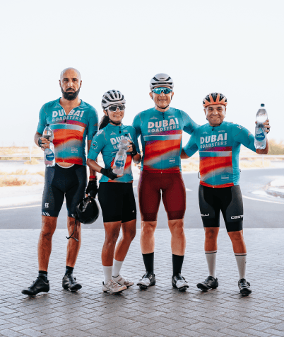 Bicycles--Equipment and supplies, Sports uniform, Bicycle clothing, Footwear, Sky, Helmet, Leg, Wheel, Shorts