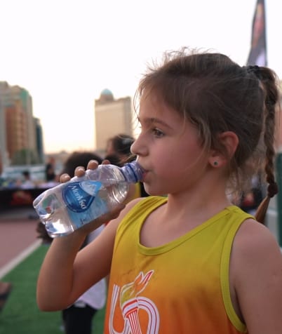 Bottled water, Plastic bottle, Drinkware, Sky, Drink, Happy