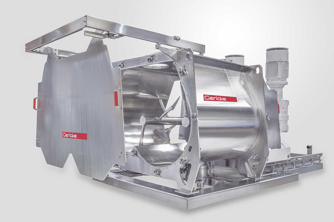 Gericke stainless steel industrial mixer with open mixing chamber and internal blades.