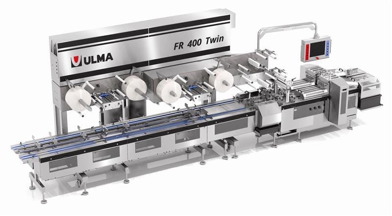 ULMA FR 400 Twin industrial packaging machine with conveyor system and multiple film rolls.