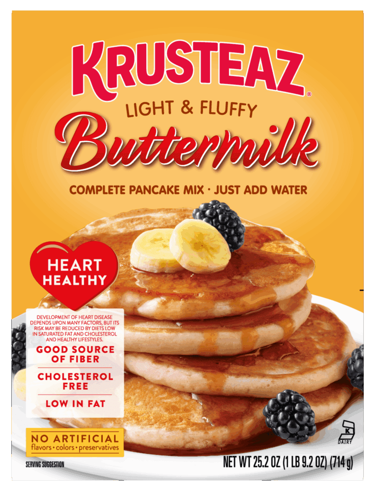 Krusteaz Light & Fluffy Buttermilk Pancake Mix box with pancakes, bananas, and blackberries. Heart Healthy label.