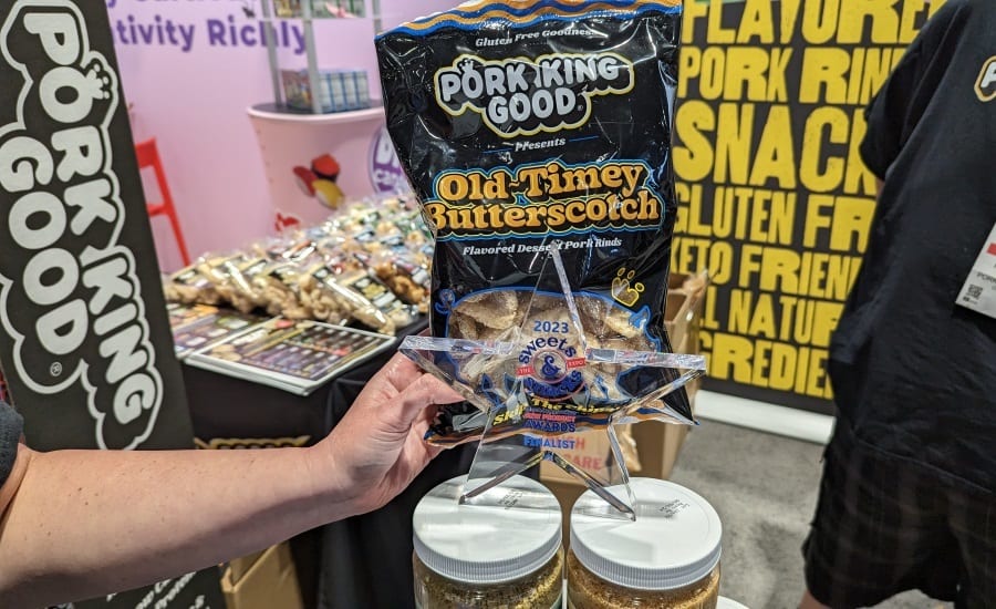 Pork rinds, Hand holding snack bag, Expo booth