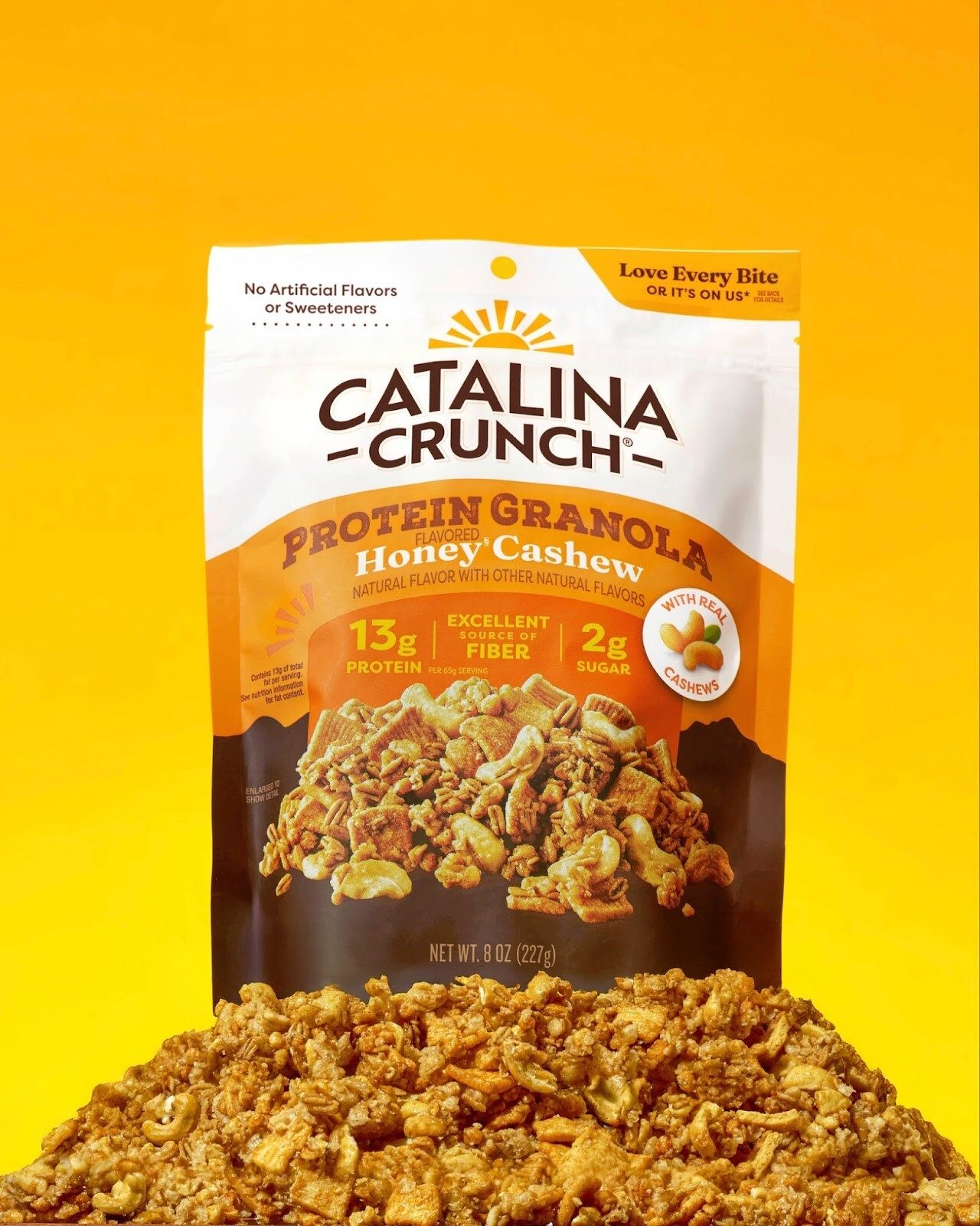 Catalina Snacks’ new Protein Granola, in Honey Cashew flavor, in brown, orange, and white packaging