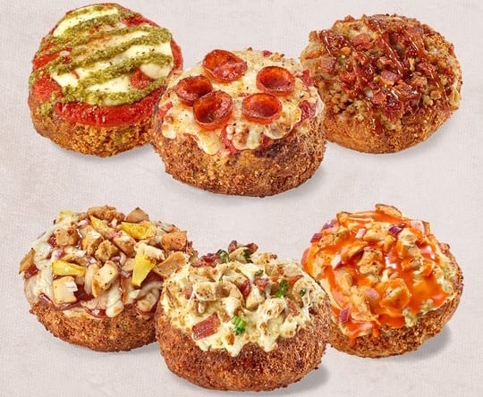 Six various savory bread bowls with different toppings, including pepperoni, pesto, bacon, and chicken.
