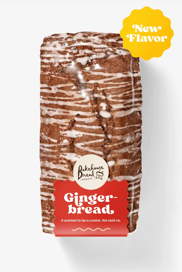 Iced gingerbread loaf in plastic packaging, with a red "Gingerbread" label and a yellow "New Flavor" tag.