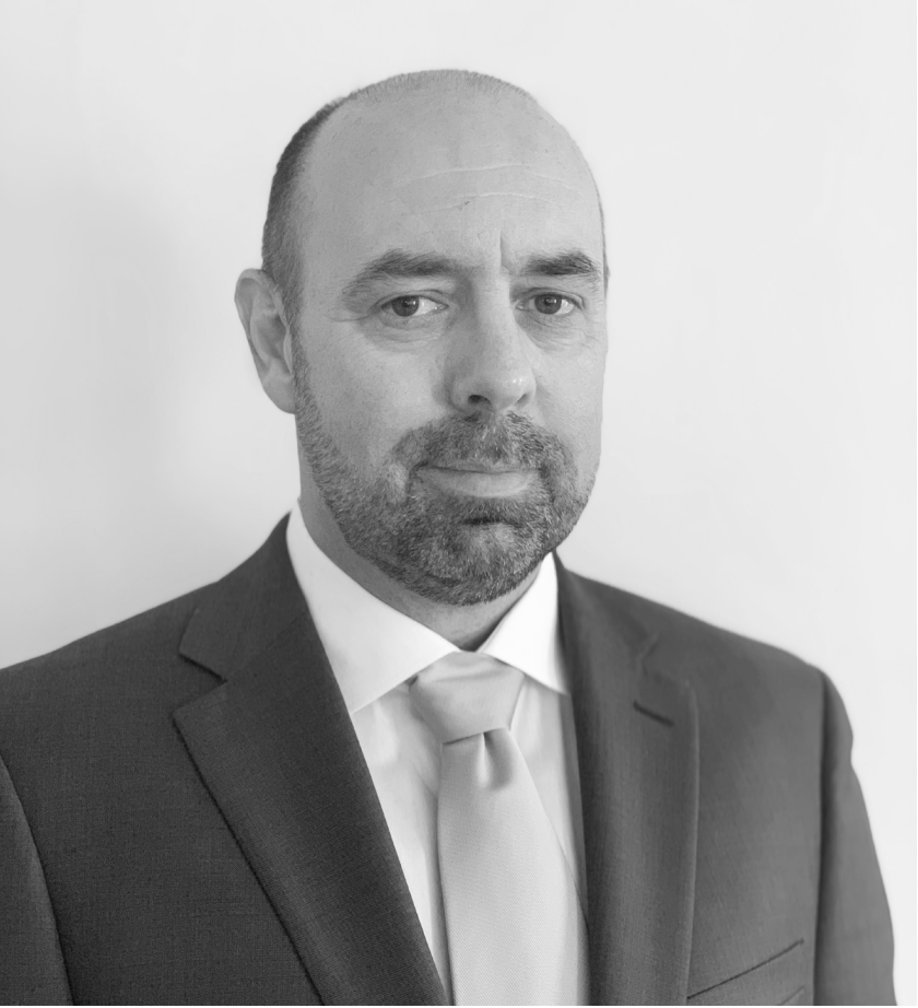 Dress shirt, Forehead, Chin, Eyebrow, Tie, Jaw, Beard, Gesture, Grey, Collar
