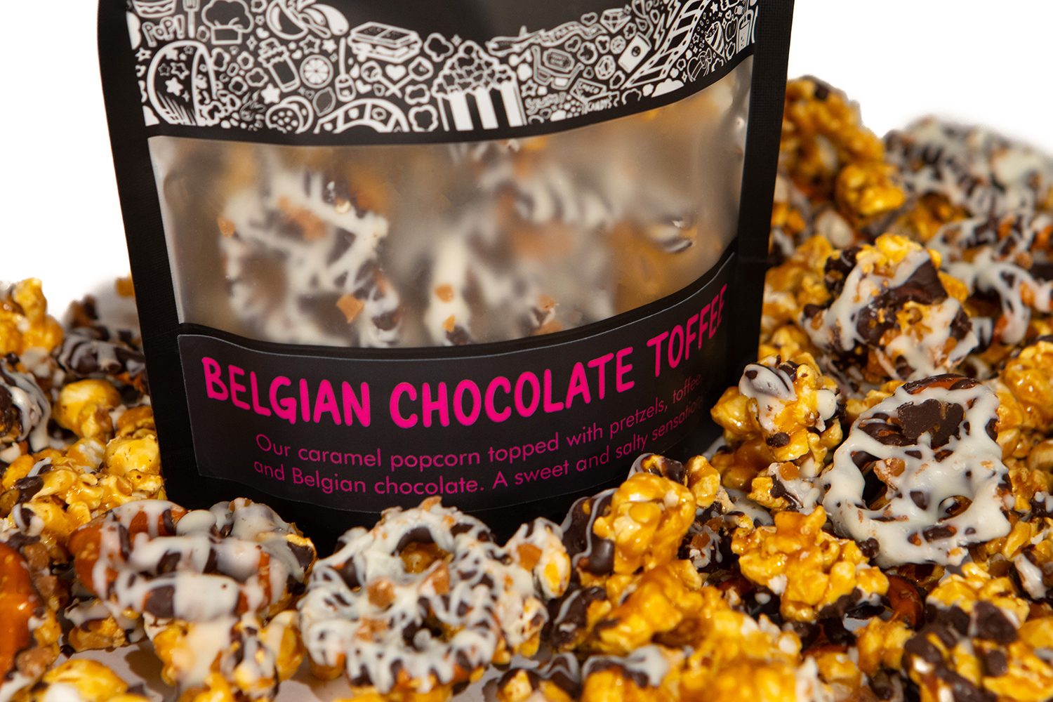 Prospector Popcorn’s Belgian Chocolate Toffee bag, surrounded by the product