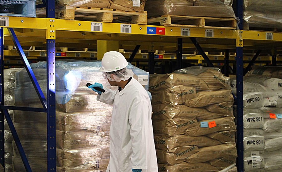 Worker, Factory warehouse, Interior, Industrial shelves, PPE, Flashlight