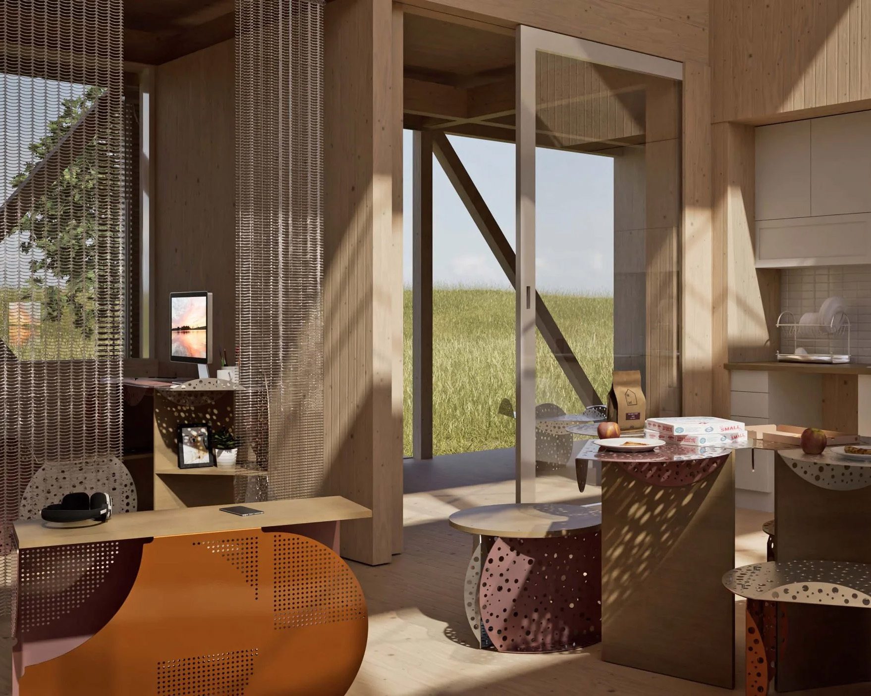 An open-plan modern wooden interior with perforated metal furniture, a kitchen, and a view of a grassy field.