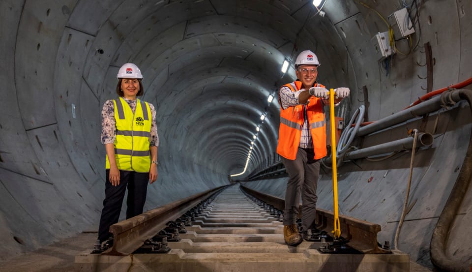 Hard hat, High-visibility clothing, Smile, Outerwear, Helmet, Workwear, Infrastructure, Engineer, Asphalt, Tradesman
