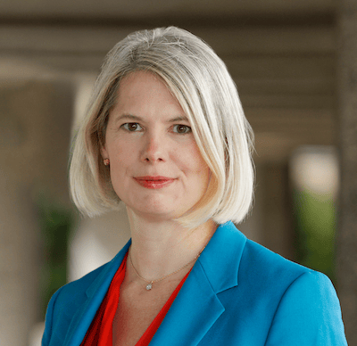 Face, Head, Lip, Chin, Eyebrow, Eye, Smile, Coat, Sleeve, Iris