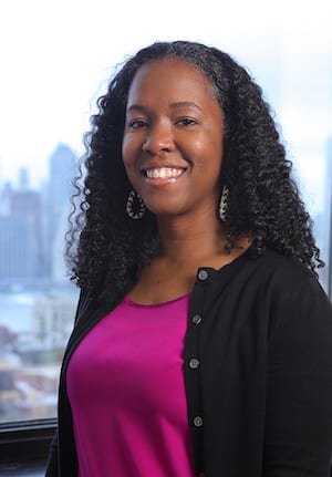 Jheri curl, Forehead, Hair, Smile, Head, Lip, Chin, Outerwear, Eyebrow, Eye