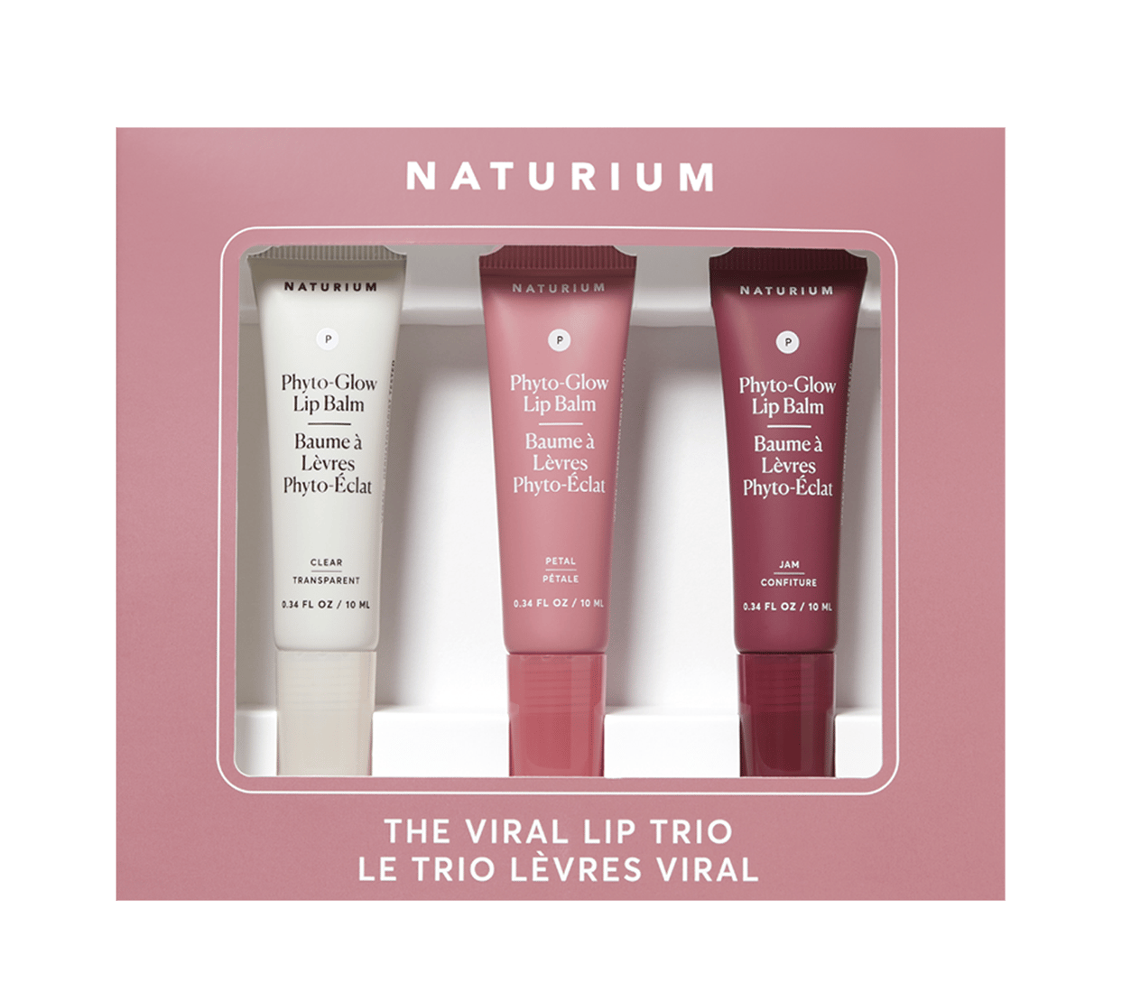 Naturium Phyto-Glow Lip Balm trio set (Clear, Petal, Jam) in pink packaging.