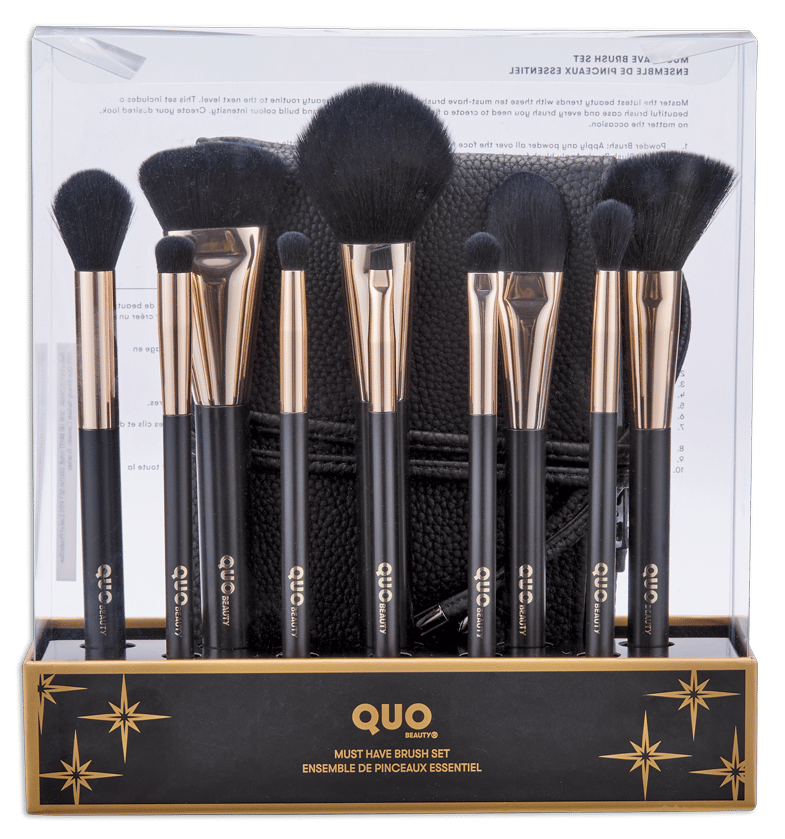 Quo Beauty 'Must Have Brush Set' with black and gold makeup brushes in clear retail packaging.
