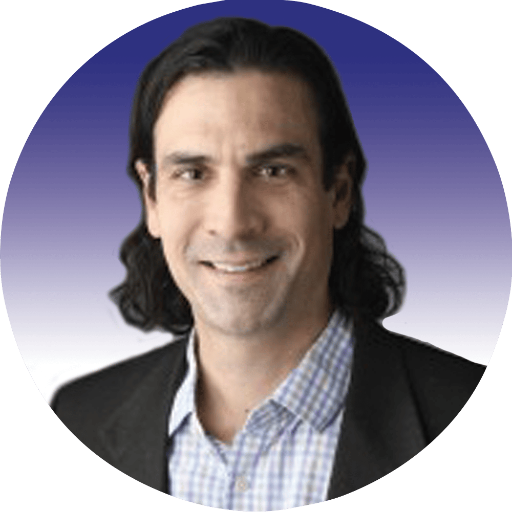 Smiling man with long dark hair.