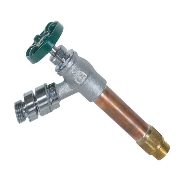 Frost-free sillcock valve with green handle, copper pipe, and brass hose spigot.