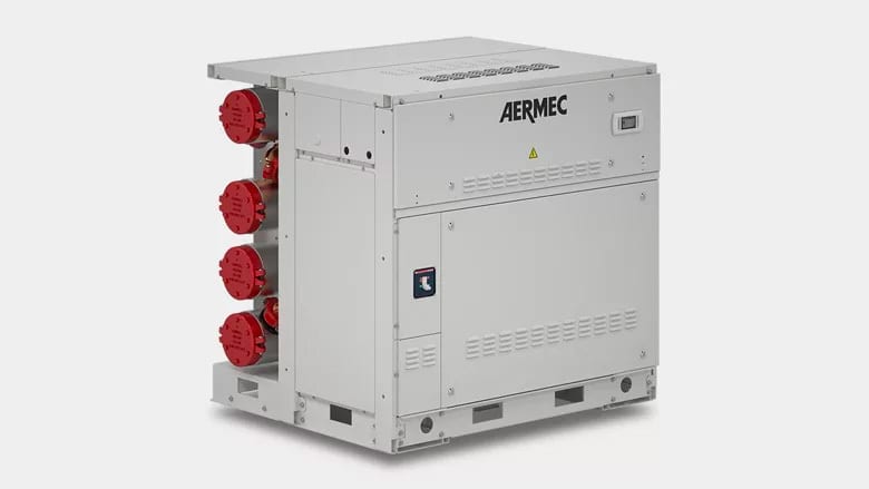 A grey AERMEC industrial chiller unit with multiple red circular ports on its side.