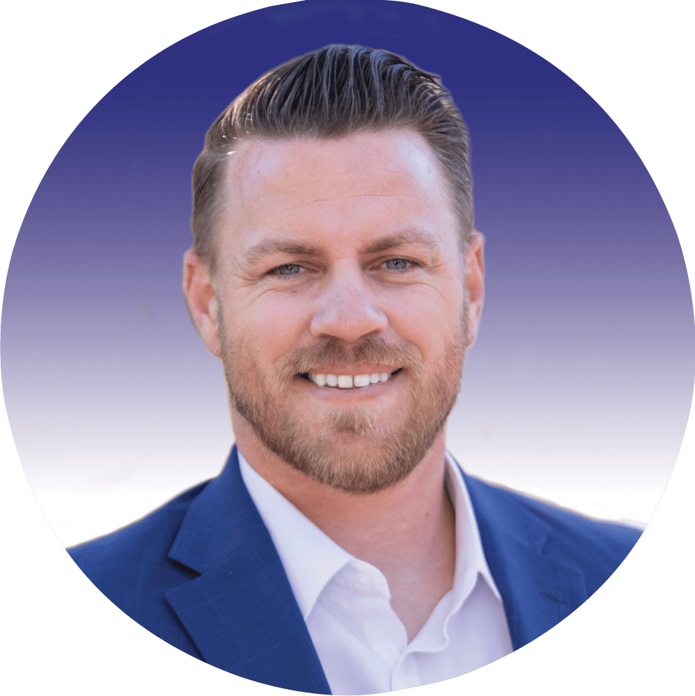 Headshot of a smiling man with a beard and blue suit against a blue gradient background in a circular frame.