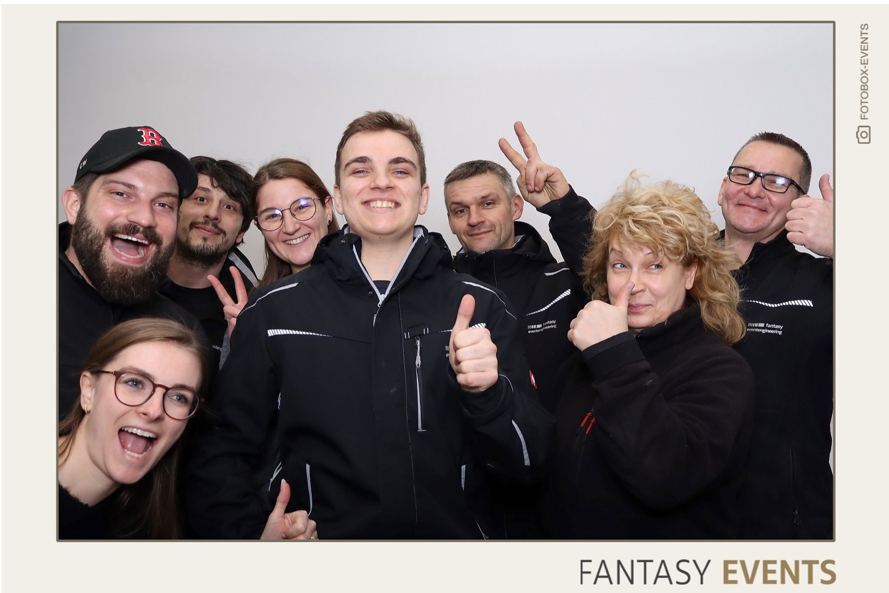 Vision Care, Social group, Facial expression, Smile, Eyewear, Glasses, Outerwear, Jacket, Happiness, Team