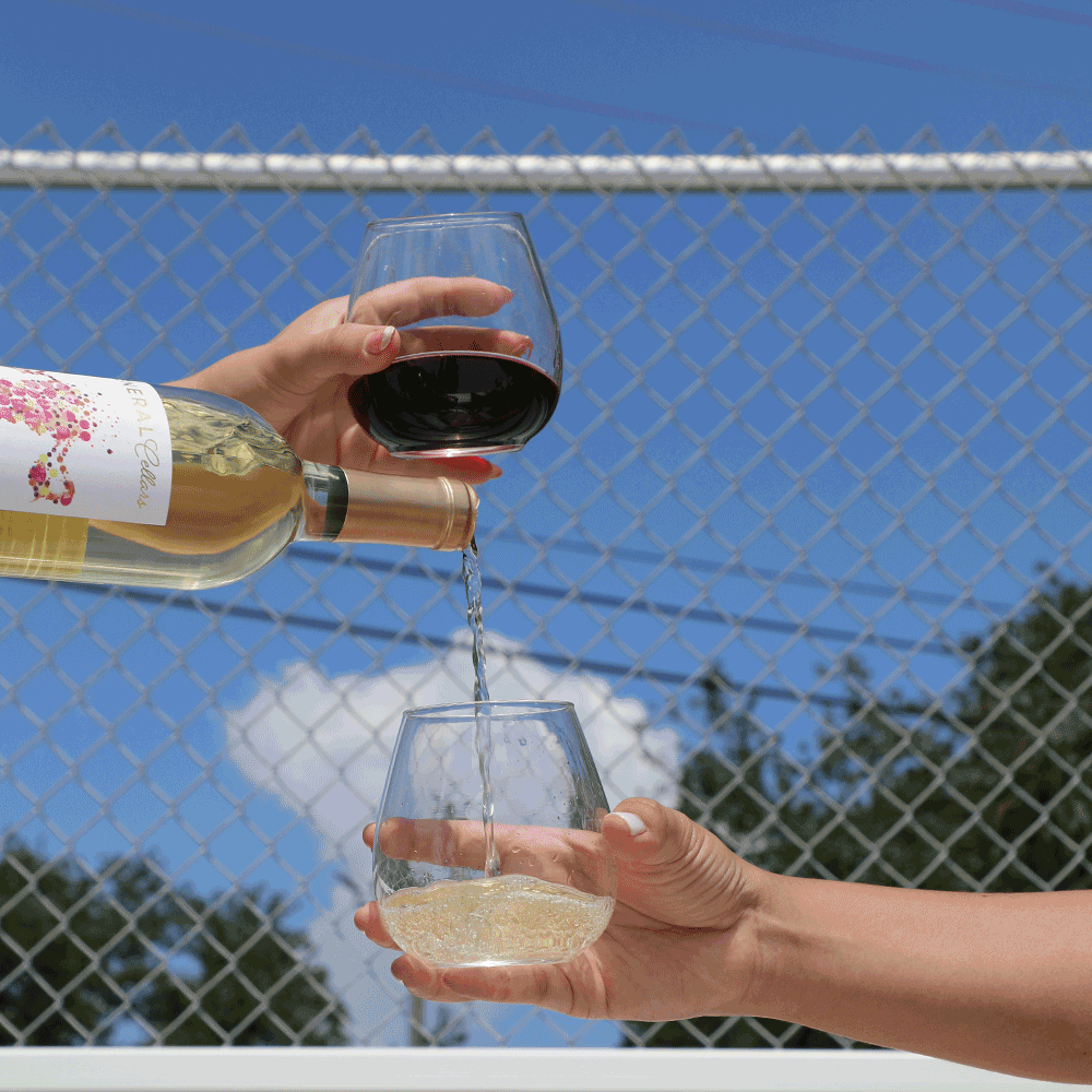 pouring wine, white wine, red wine, hands, bleachers