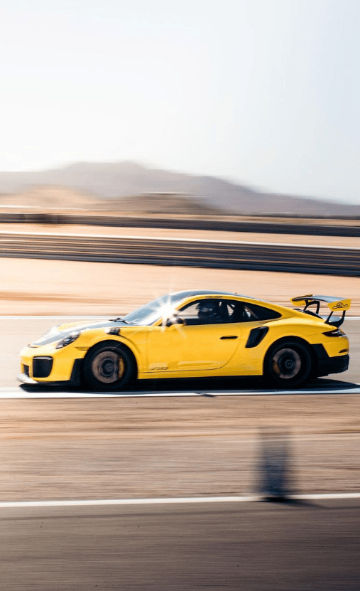 Automotive design, Race track, Tire, Wheel, Vehicle, Car, Sky, Hood, Rolling
