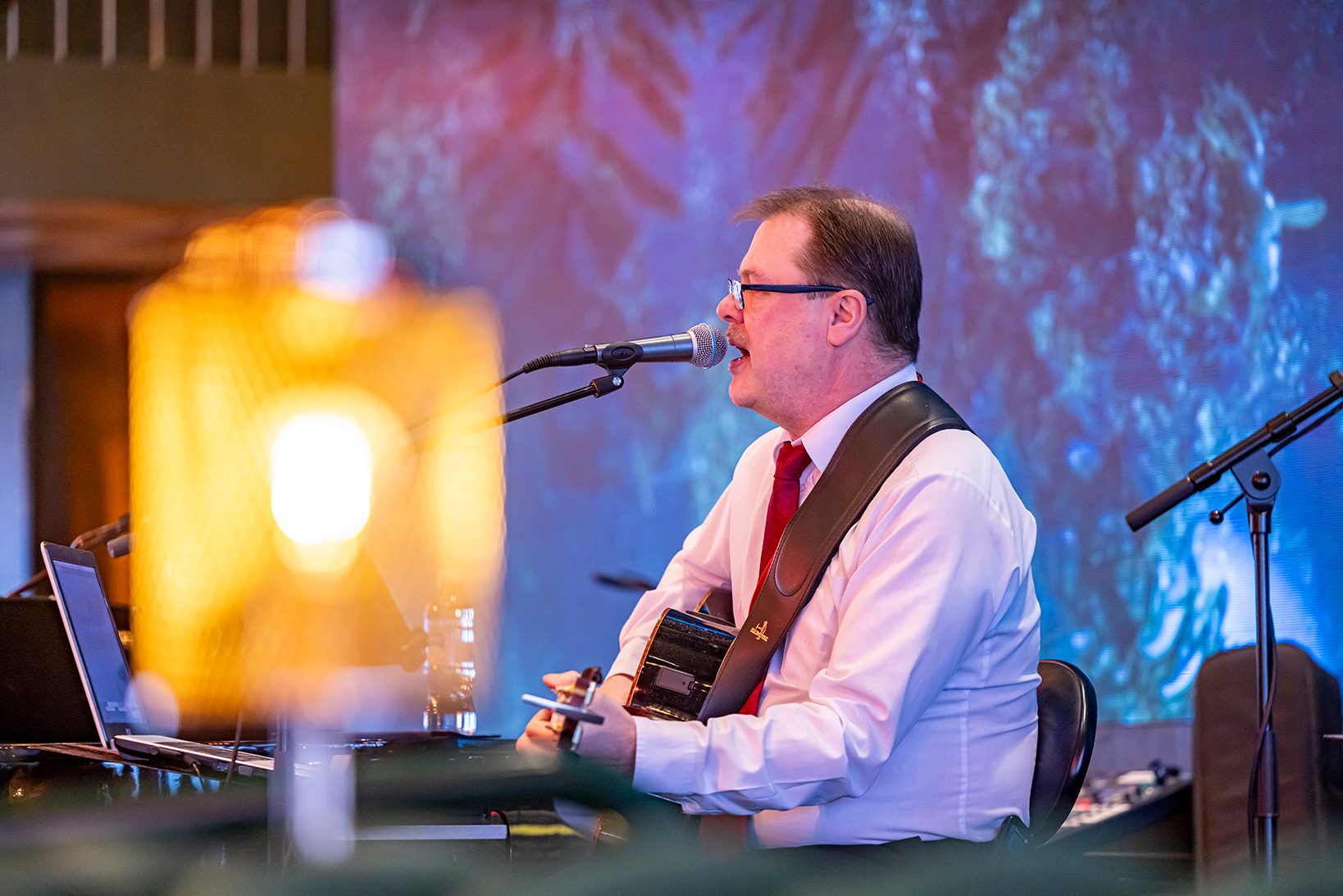 Public address system, Musical instrument, Guitar accessory, Music artist, Performing arts, Audio equipment, Microphone, Musician