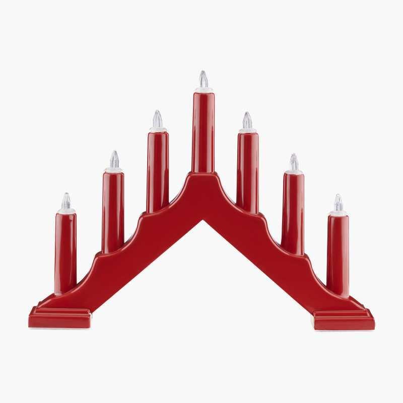 A red candle arch with seven electric white candles on a white background.