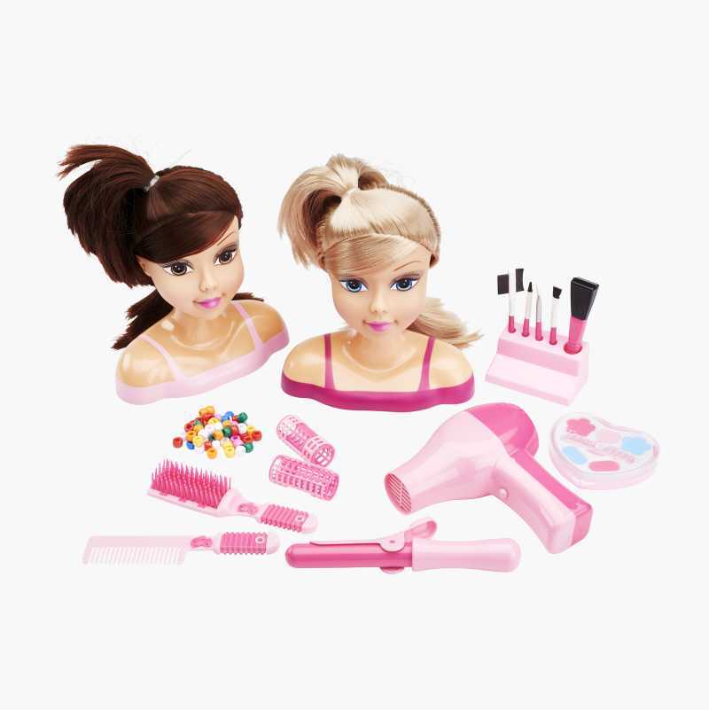 Two doll heads (blonde and brown hair) with hair styling and makeup accessories.