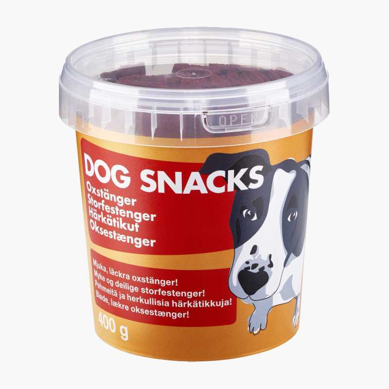 A clear plastic tub of "DOG SNACKS" with a dog illustration and multi-language label, 400g.