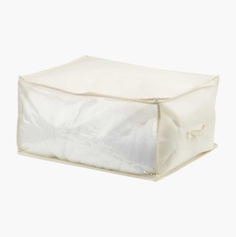 Cream-colored rectangular storage bag with a clear front panel, filled with white fabric, and a side handle.