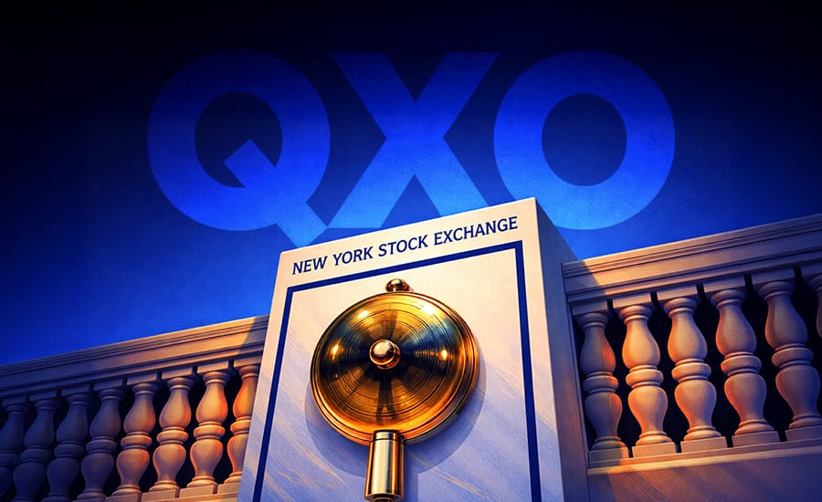 A golden bell and 'New York Stock Exchange' sign with a 'QXO' logo in the blue background.