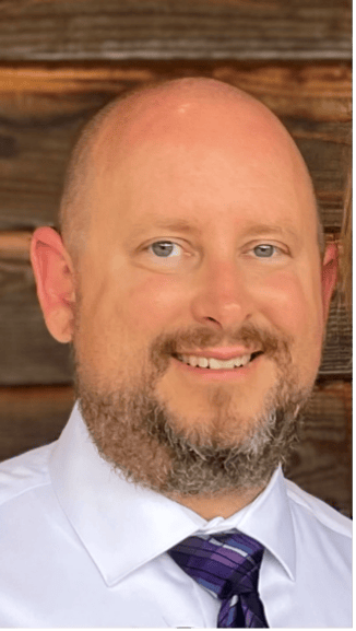 Dress shirt, Forehead, Nose, Cheek, Smile, Chin, Eyebrow, Beard, Vertebrate, Neck