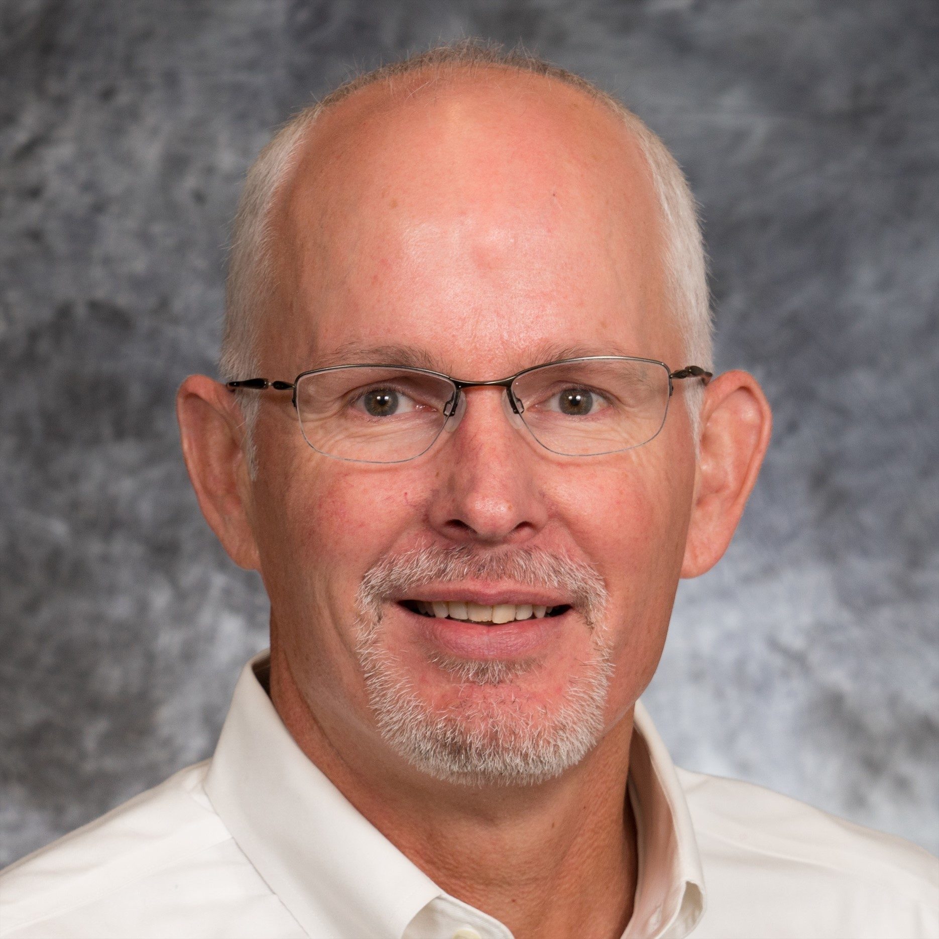 Vision care, Dress shirt, Facial hair, Forehead, Nose, Glasses, Smile, Eyewear, Collar, Wrinkle