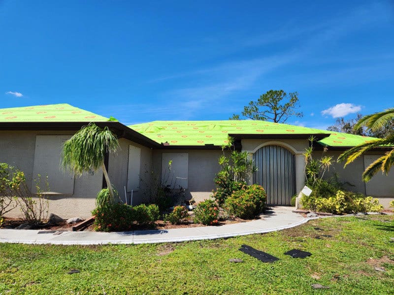 Land lot, Residential area, Plant, Sky, Cloud, Building, Shade, Grass, Landscape