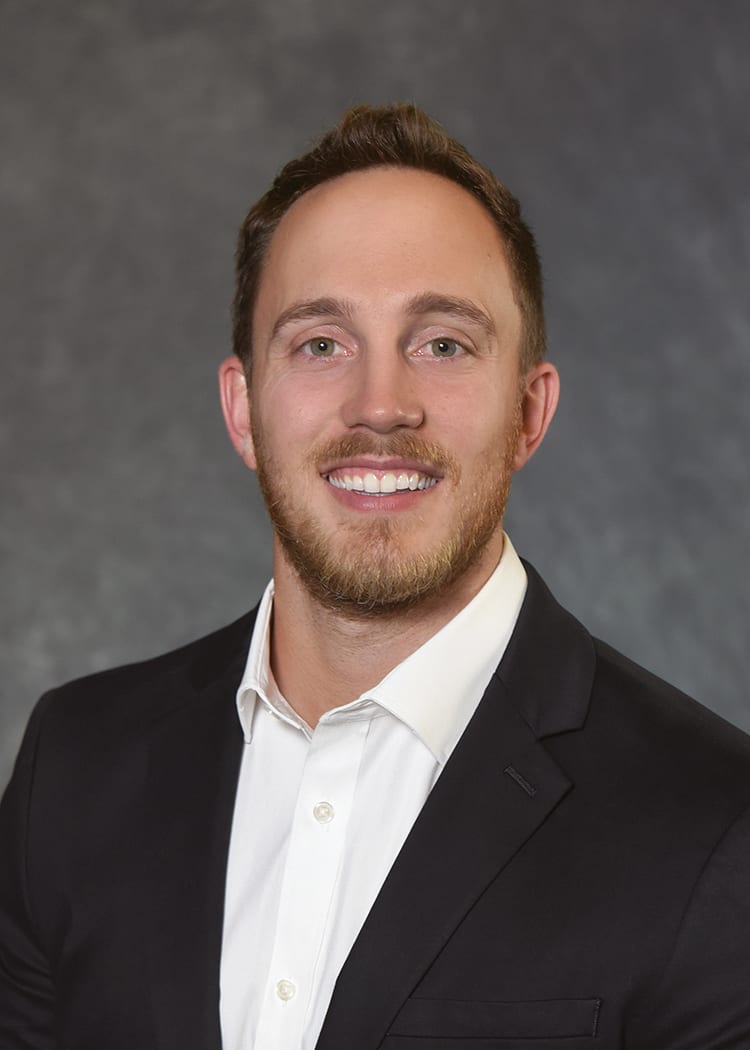 Dress shirt, Forehead, Smile, Cheek, Chin, Eyebrow, Beard, Jaw, Sleeve