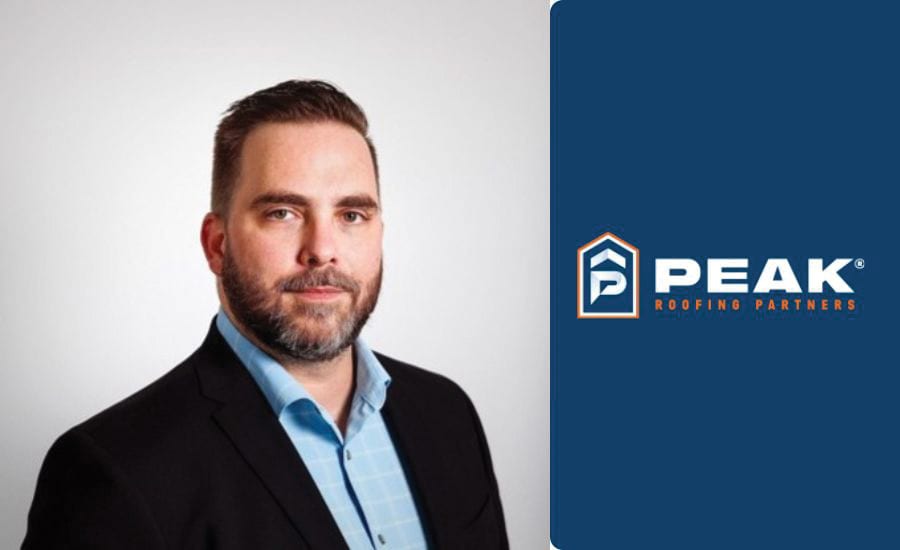 Man in suit and blue shirt next to Peak Roofing Partners logo.