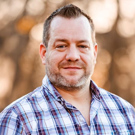Facial hair, Chin, Cheek, Eyebrow, Smile, Forehead, Skin, Happiness, Collar, Jaw