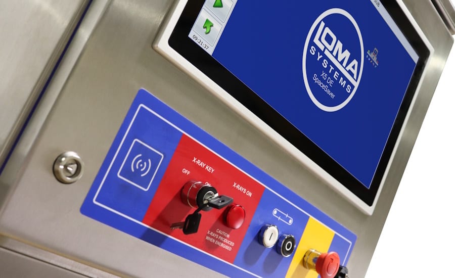 Control panel for a LOMA SYSTEMS X-ray machine, featuring a screen, key switch, and buttons.
