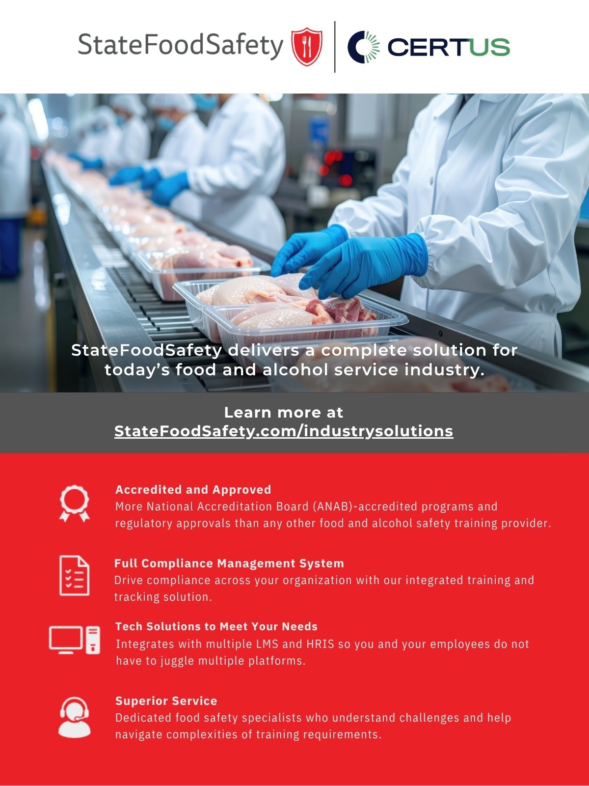 Workers in protective gear handling packaged chicken on a conveyor belt in a food processing facility.